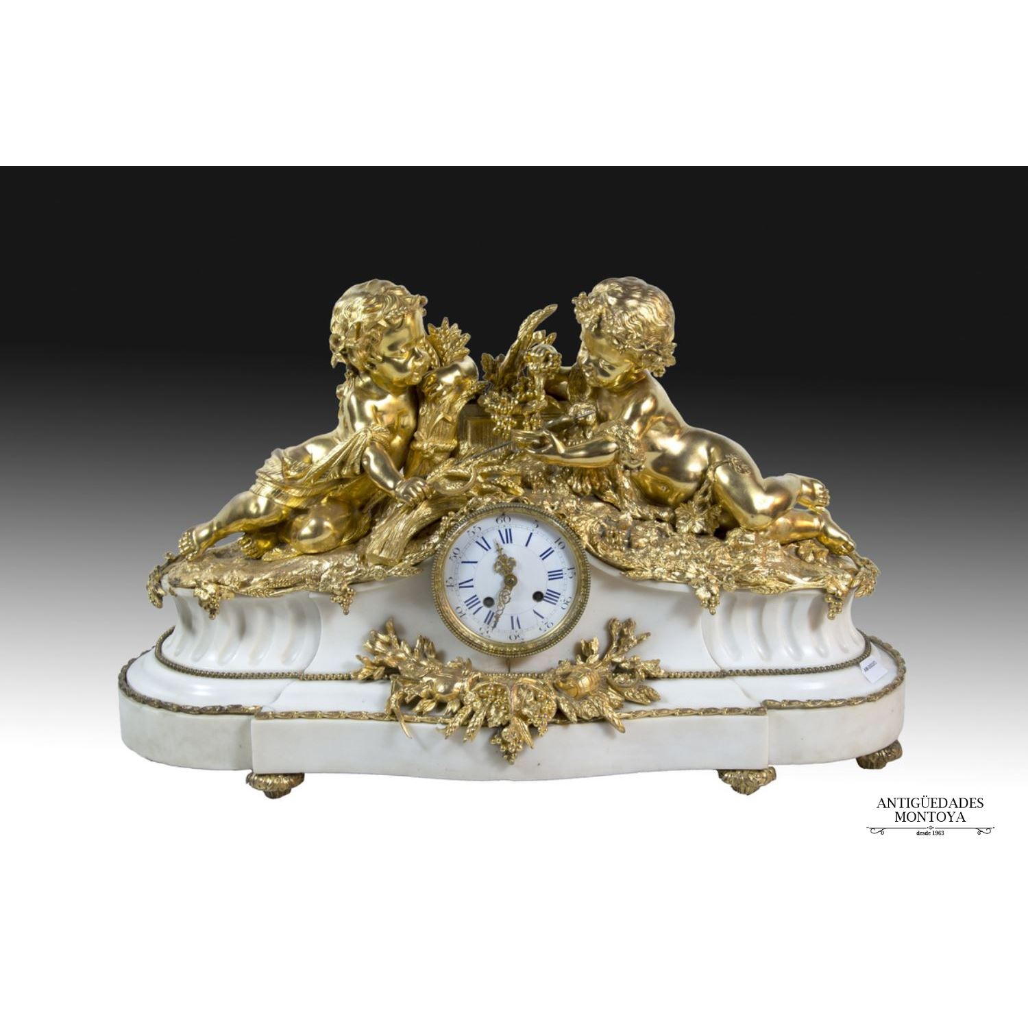 Table clock with garnish, S. XIX.